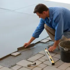 Czym przykleić kostkę brukową do betonu, aby uniknąć problemów?